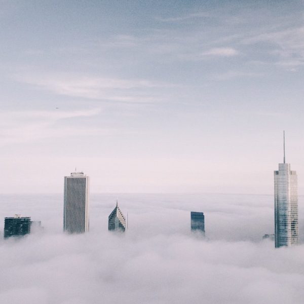 An image of the Chicago skyline with fog and clouds