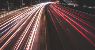 A night image of the illuminated highway in a city of Australia