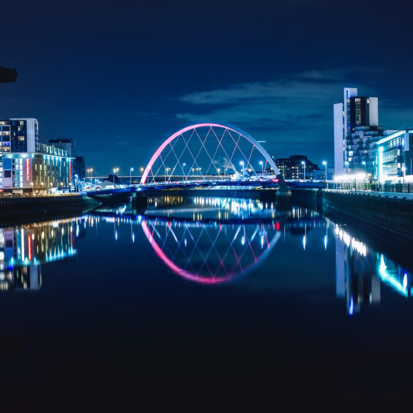 A panoramic of a night at the Clyde Arc bridge in Glasgow Scotland