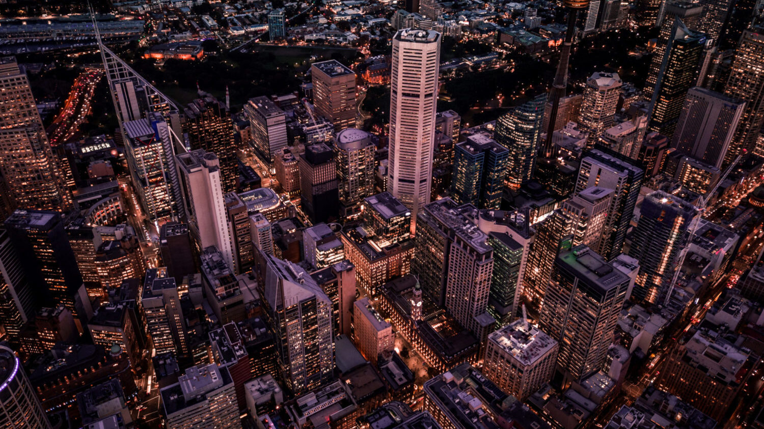 A view of tall buildings in the downtown of an international city.